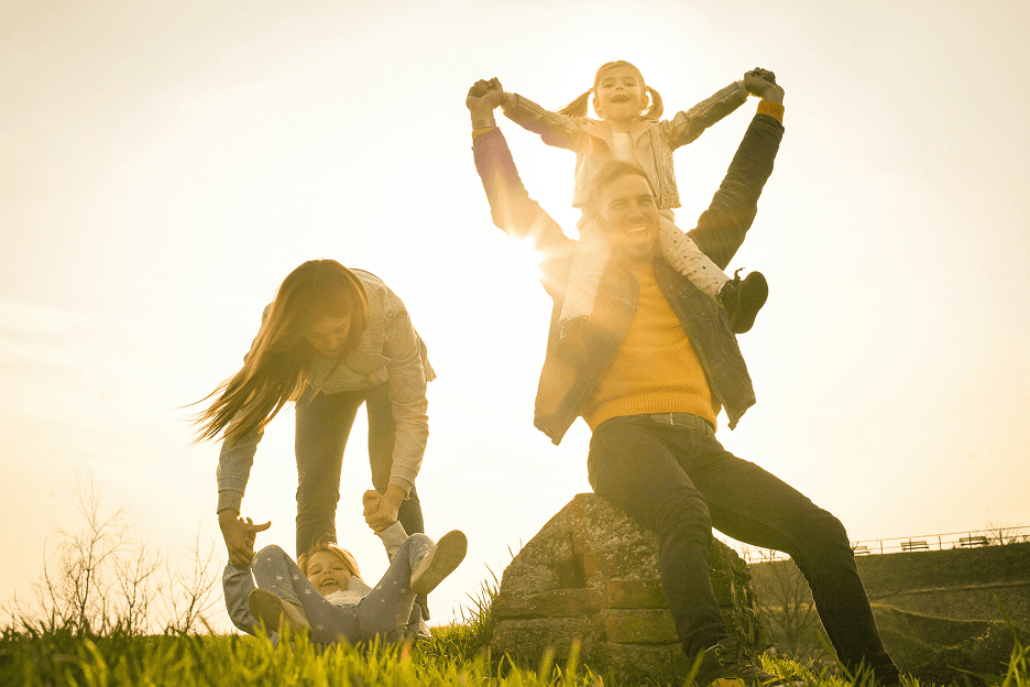 Family outdoors having fun